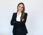 a-woman-in-a-black-suit.jpg a woman in a black suit