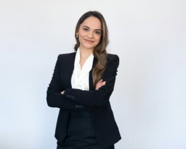 a woman in a black suit